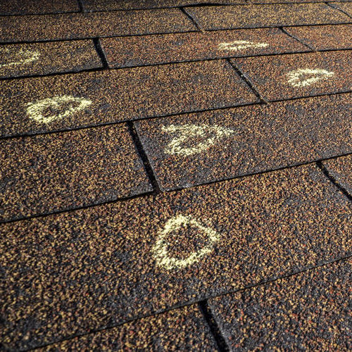 Marked Hail Damage On A Roof